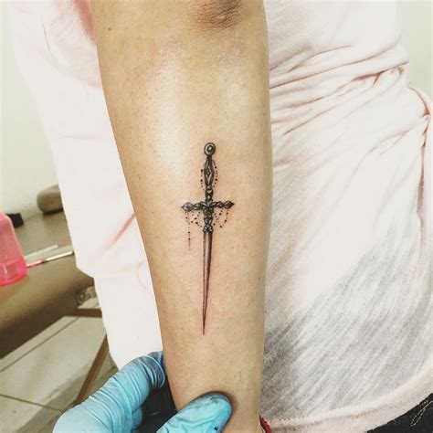 40 Flaunt Your Sense of Sophistication with These Sword Tattoo Ideas