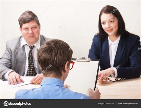 Young man during job interview and members of managemen — Stock Photo ...