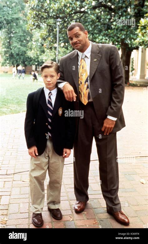 FIRST KID BROCK PIERCE, SINBAD Date: 1997 Stock Photo - Alamy