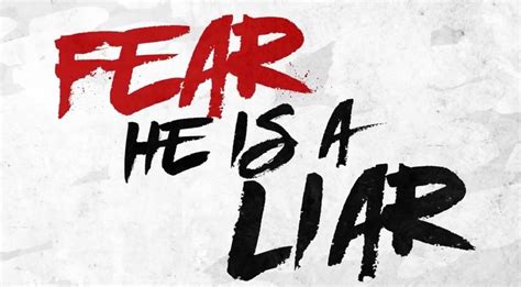 the words fear he is a liar written in black and red