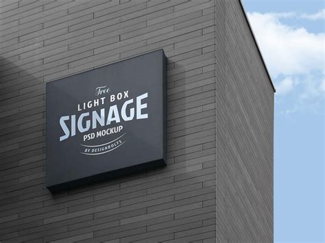 Free Logo Signage Board on Building Mockup (PSD)