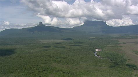 HD stock footage aerial video of mountain peaks, jungle, and river ...