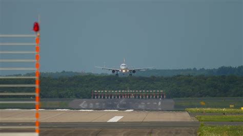 Jet airliner landing. Passenger plane landing at the airport in Germany ...