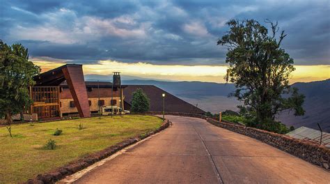 Entrance to the luxury Ngorongoro Wildlife Lodge viewed at sunset ...