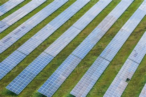 aerial view on farm field of solar panels. Renewable solar energy ...