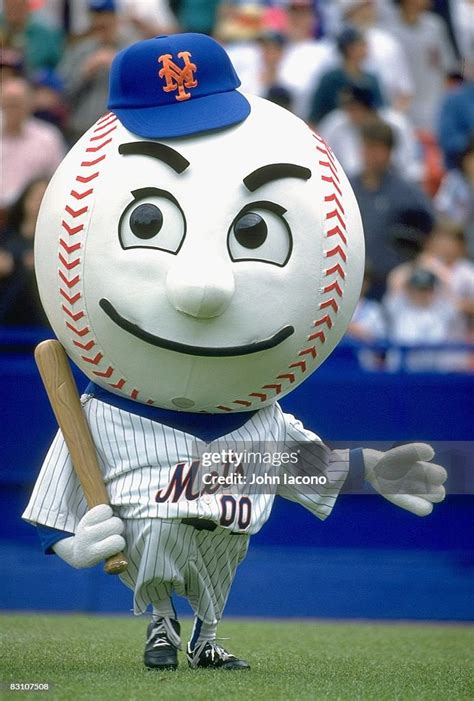 New York Mets mascot Mr. Met holding bat during game vs San Francisco ...