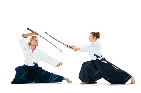 Premium Photo | Men fighting at aikido training in martial arts school ...