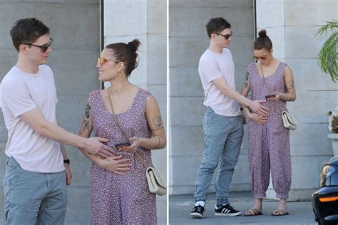 Evan Peters cradles Halsey's stomach in new photos