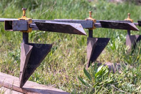 Agricultural manual metal plow on the field. Plowing the land before ...