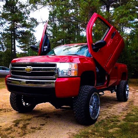 Lifted Chevrolet Silverado Pick-Up Truck with Lambo Doors | Trucks ...