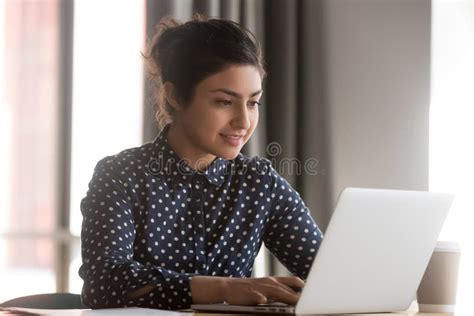 Attractive Indian Woman Office Worker Typing on Computer Stock Image ...