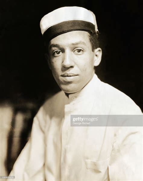 Langston Hughes wears a busboy uniform. The African American writer ...