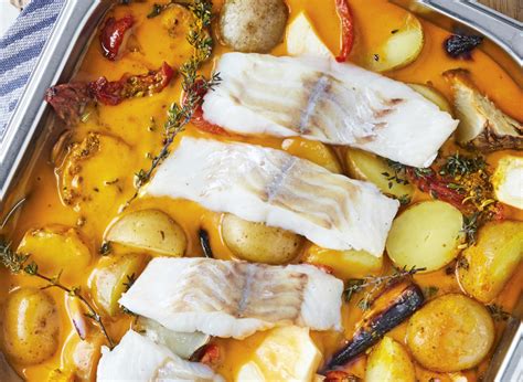 Baked Alaska pollock with root vegetables in red curry and coconut ...