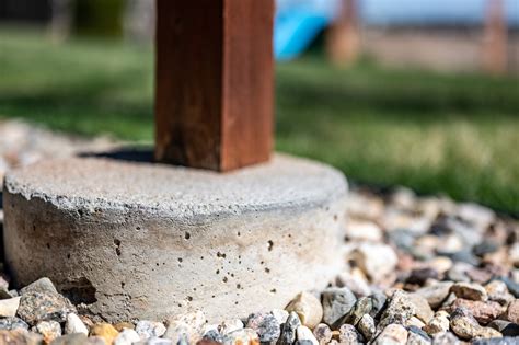 Should Deck Posts Be Set In Concrete (Or Use Anchors)? - Your DIY Backyard