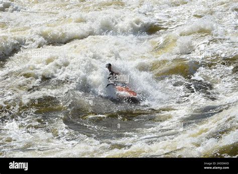 Kayaking in very rough rapids. The river is violent with a lot of ...