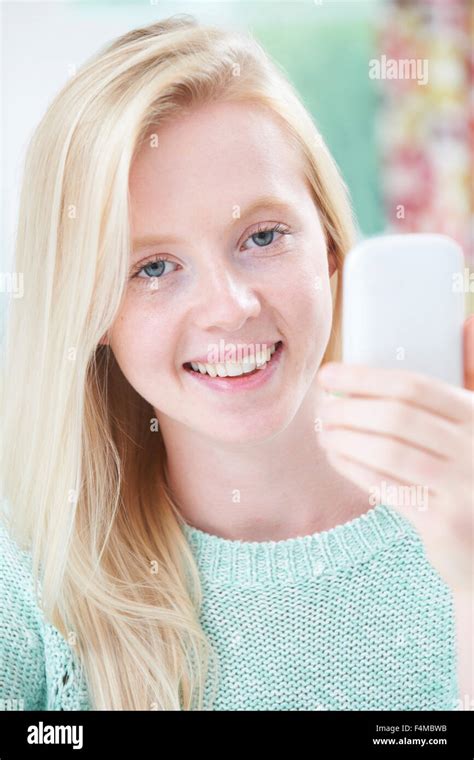 Teenage Girl Taking Selfie On Mobile Phone Stock Photo - Alamy