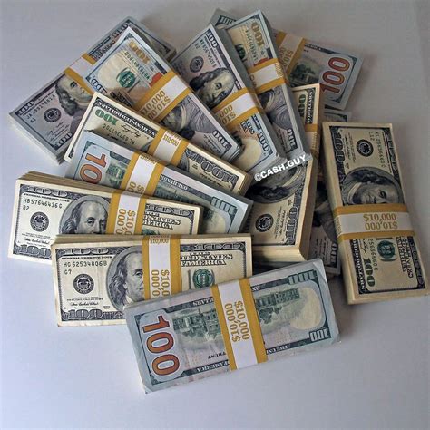 $100 dollar bills stacks. Colorful money stacks at the desk. Enjoy ...