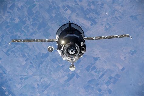 The Soyuz MS-19 crew ship carrying three Russian crew members ...