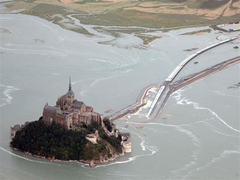 Normandy 'island' Mont Saint-Michel cut off by extreme high tide | The ...