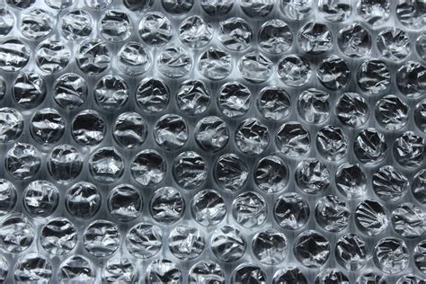 Bubble wrap on the black background Free Photo Download | FreeImages