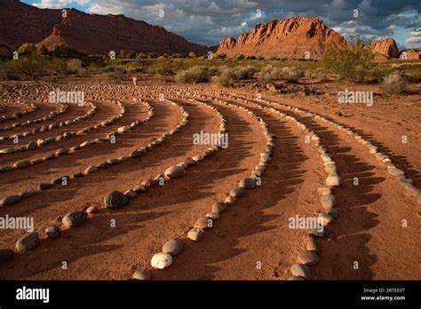 Hiking trail through Snow Canyon, with circles of stones in a meeting ...