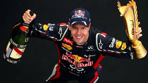 Download Sebastian Vettel Wine And Trophy Wallpaper | Wallpapers.com