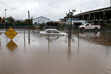 Heavy rain brings flooding, landslides to California - CBS News