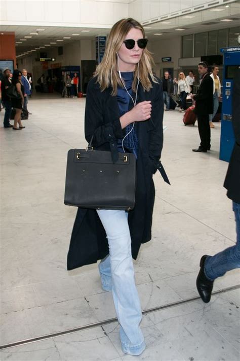 Celebrities Airport Style - Celebs Airport Fashion Photos