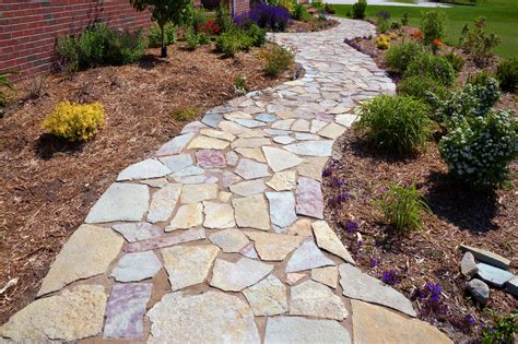 How to Create a Walkway With Pavers on a Grade