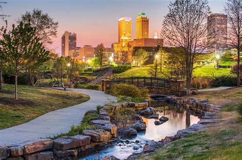 Riverwalk To The Tulsa Oklahoma Skyline Photograph by Gregory Ballos