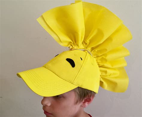 Woodstock costume made from a yellow baseball cap and stiff fabric ...