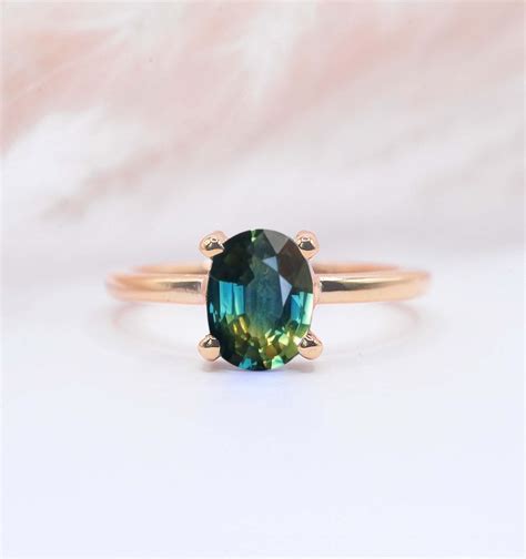 Oval teal sapphire ring and wedding band - DIORAH JEWELLERS