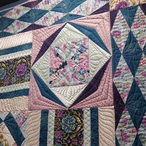 “This quilt I quilted for #quiltmarket shows just how good geometric ...