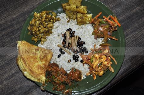 A Newari Platter. Chiura topped by fried Soyabeans and Ginger ...