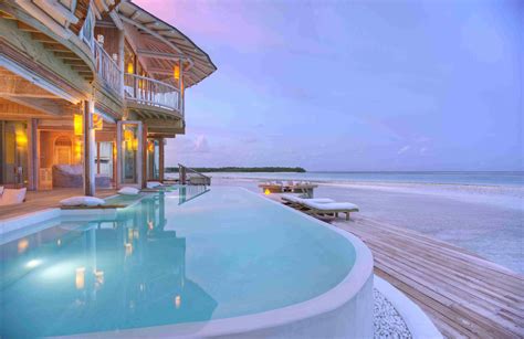 These villas in the Maldives have slides to take you right into the ...