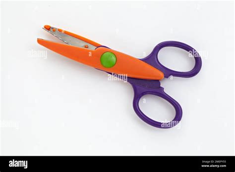 Deckle edge scissors hi-res stock photography and images - Alamy