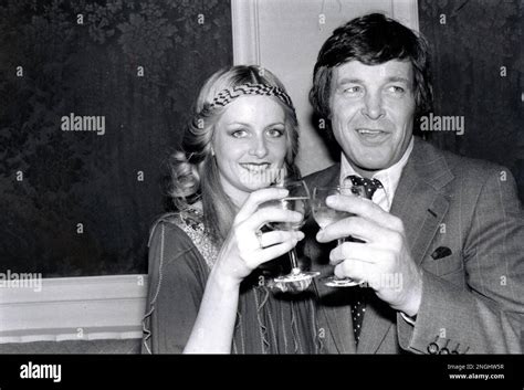 Film actress and singer Twiggy, 26, is shown with her partner and ...