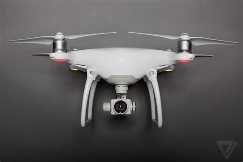 DJI's revolutionary Phantom 4 drone can dodge obstacles and track ...