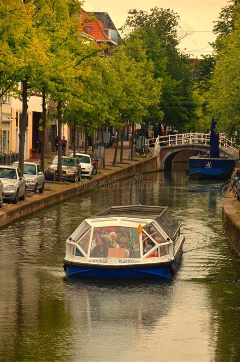 Delft Canal Cruise editorial image. Image of sightseeeing - 33602240