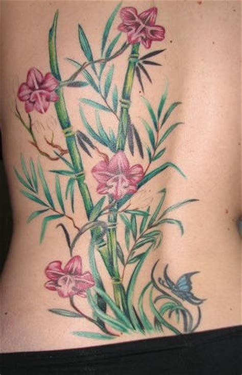 Orchid flower and bamboo tattoo - Tattooimages.biz