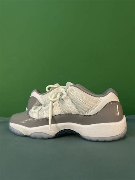 Jordan Brand Nike Air Jordan 11 Low Cement Grey 2023 | Grailed