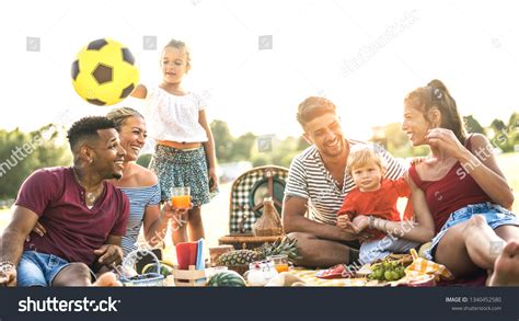 Happy Multiracial Families Having Fun Together Stock Photo 1340452580 ...