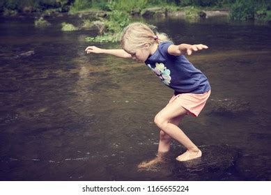 1,443 Kids Playing In The Creek Stock Photos, Images & Photography ...