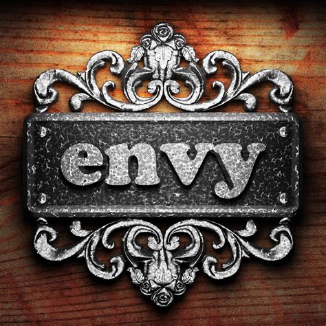 envy word of iron on wooden background 6341903 Stock Photo at Vecteezy