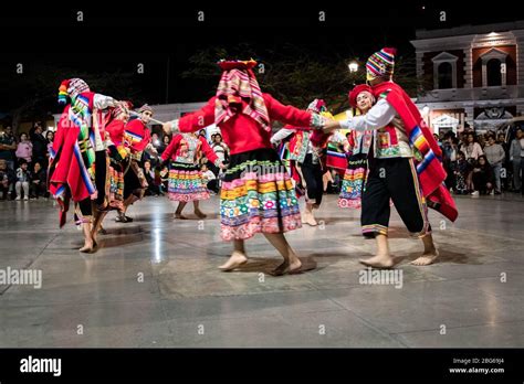 Dancers in colourful costumes performing traditional Huayno Cusqueño ...