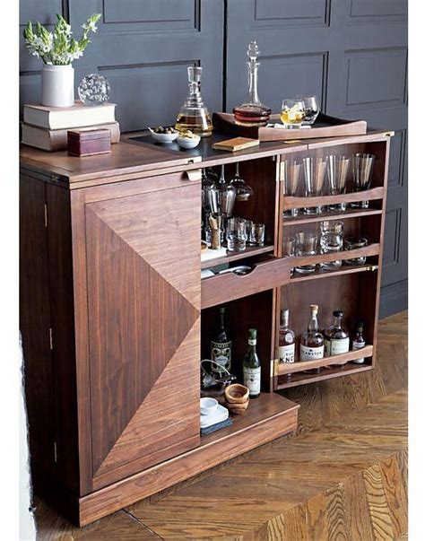 The Maxime Bar Cabinet holds a lot. You get a removable tray, open ...