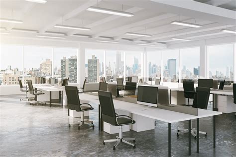 Modern open space office with city view - The Judson Group