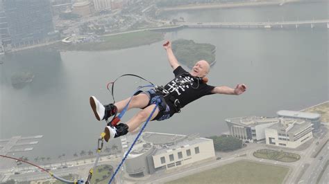 Liverpool man does world's highest bungee jump backwards for charity ...