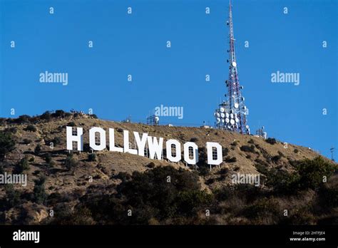 Hollywood sign on mountain against a clear blue sky in Los Angeles ...