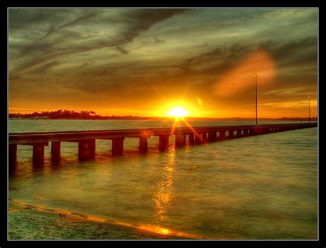 Sunset & Jetty | I watched the melancholy golden wash of the… | Flickr